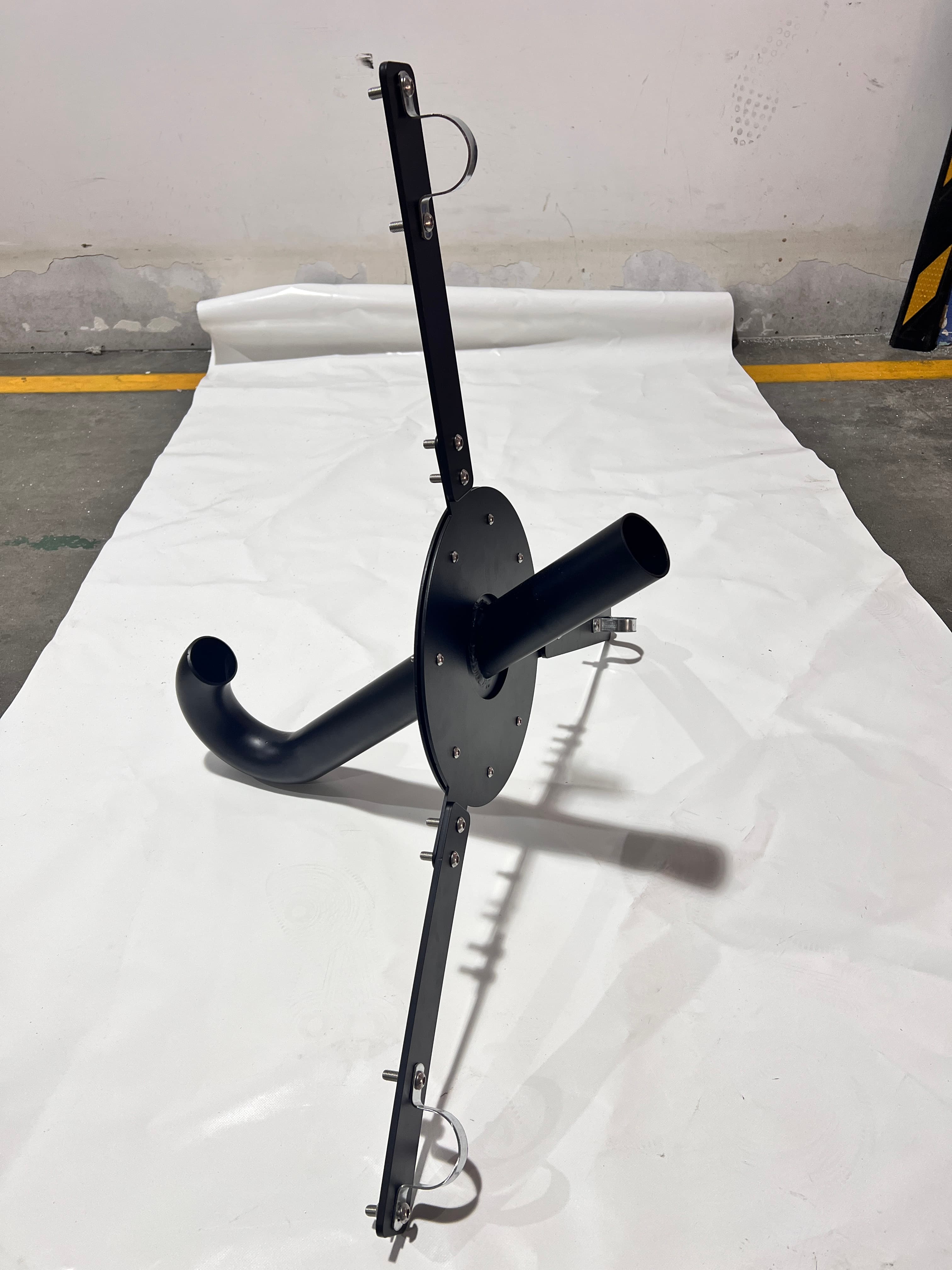 Curved mechanical ventilation pipe with its cover flange and frame mounting bracket