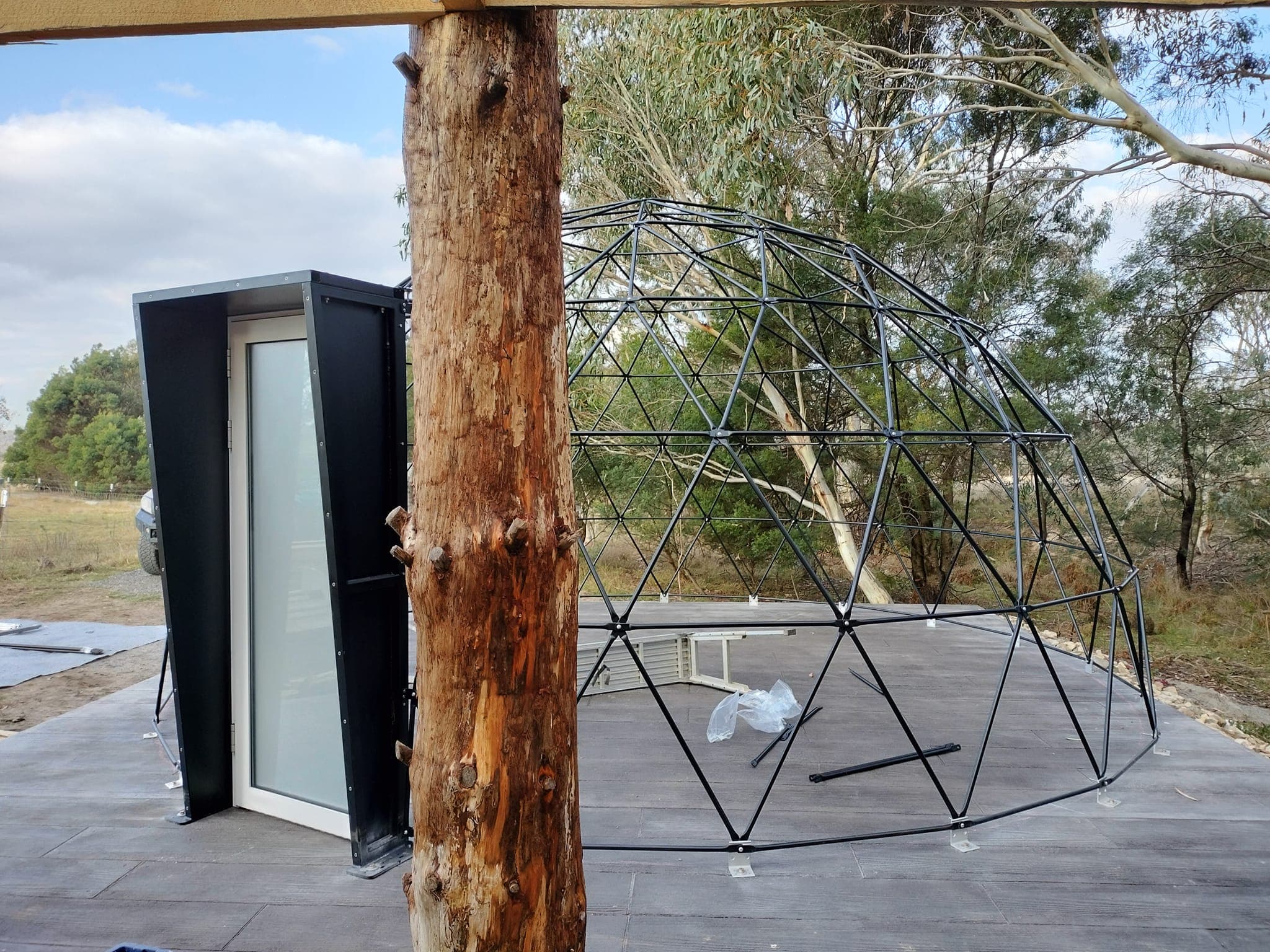 Upgraded black steel Luna dome framework assembled on its platform