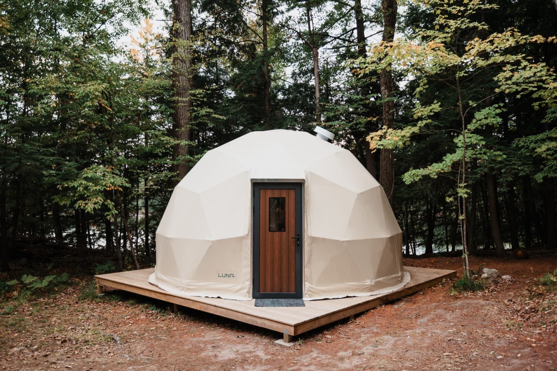 Luna dome placed in a forest setting