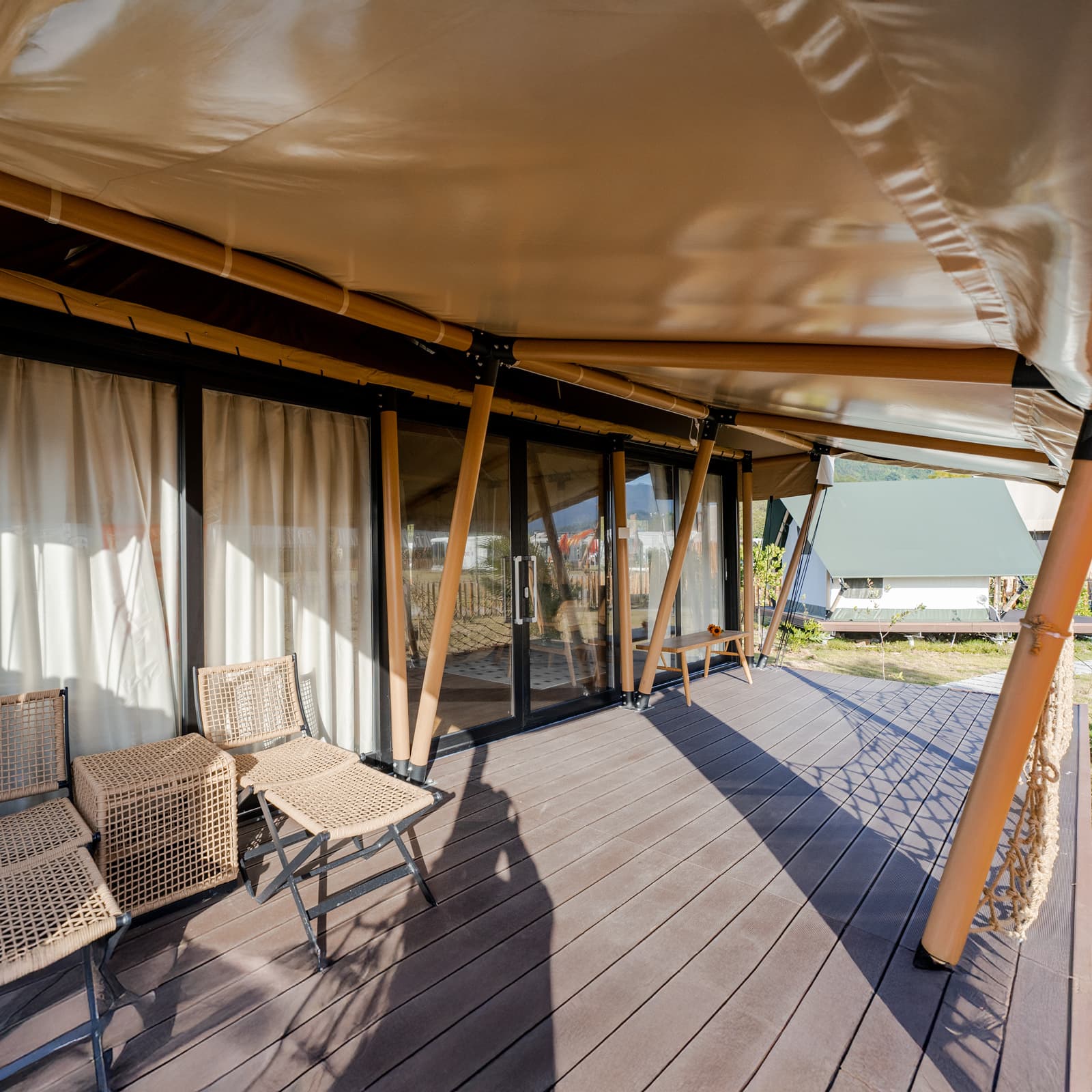 Safari tent deck with outdoor seating